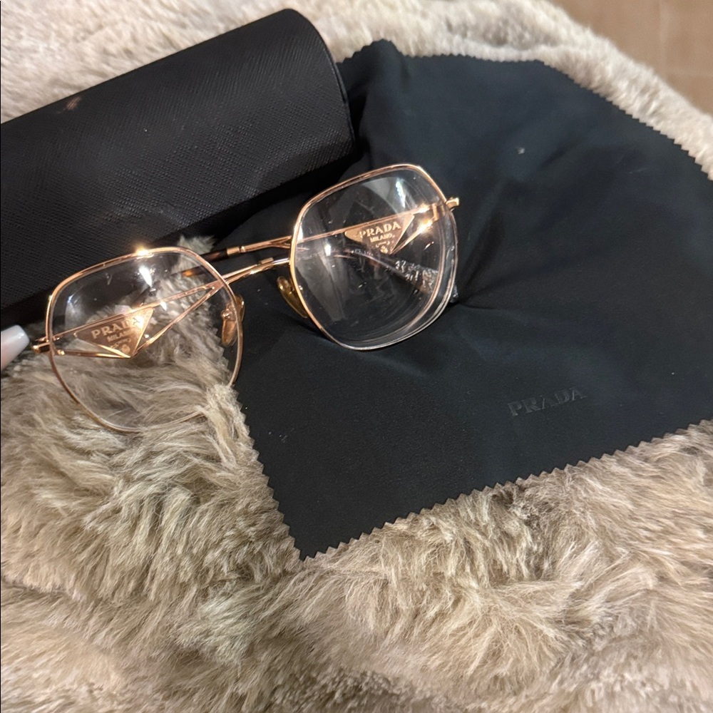 Prada Women's Gold Frame Glasses